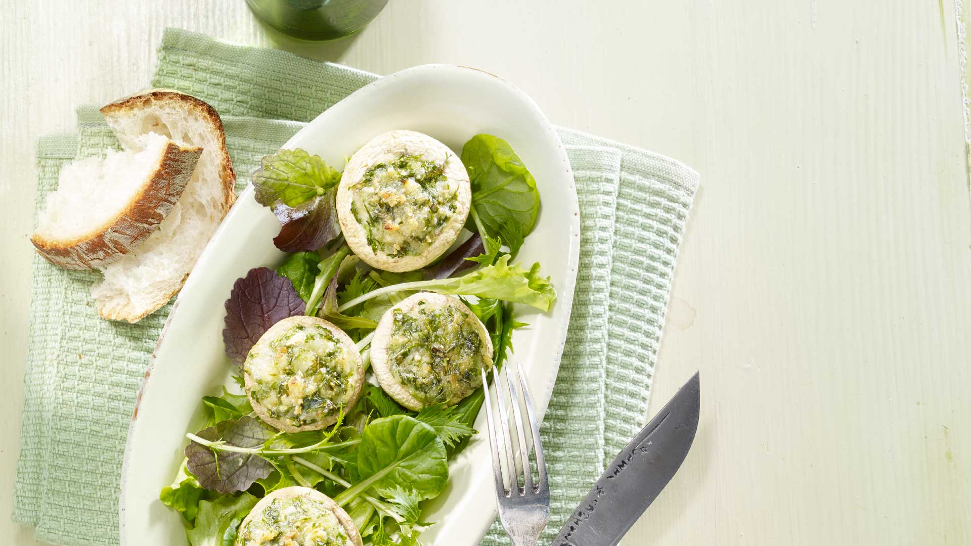 Bärlauch-Champignons mit Schweizer Emmentaler AOP
