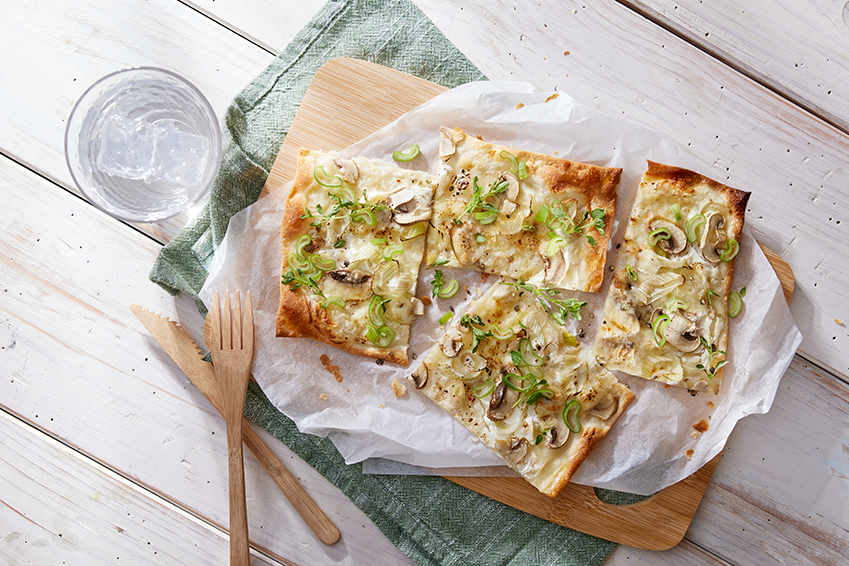 Flammkuchen mit Champignons und Vacherin Fribourgeois AOP